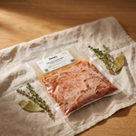 Shredded Angus Beef by Nena's Kitchen — premium catalog editorial shot on linen and oak