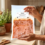 Shredded Angus Beef held by Nena's Kitchen founder — casero Venezuelan homemade